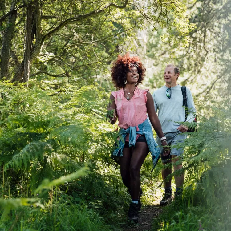 Couple on romantic walk in Woods near London