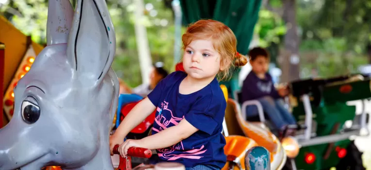 Young family at theme park near Marlow